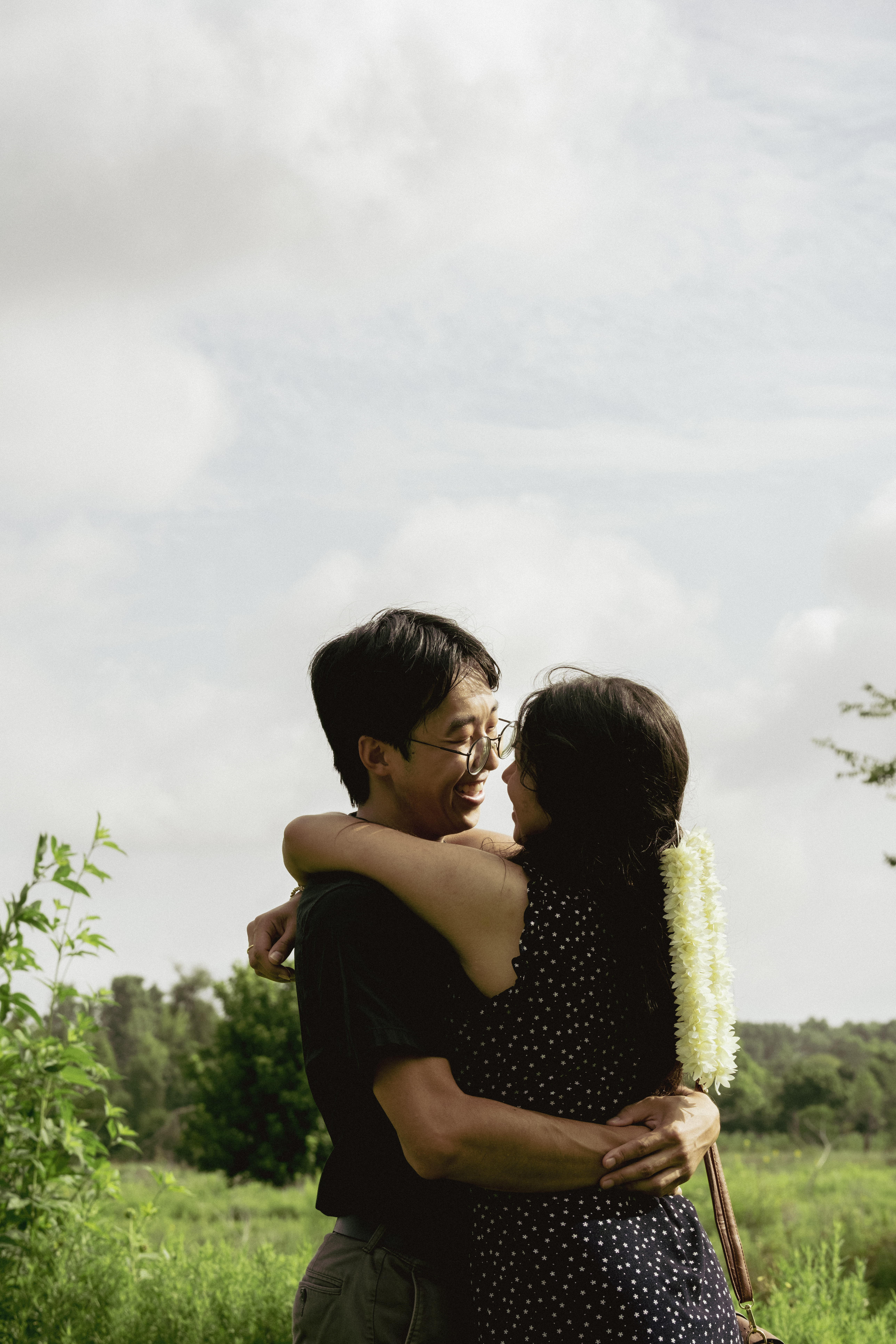 Julie and Isaac embracing